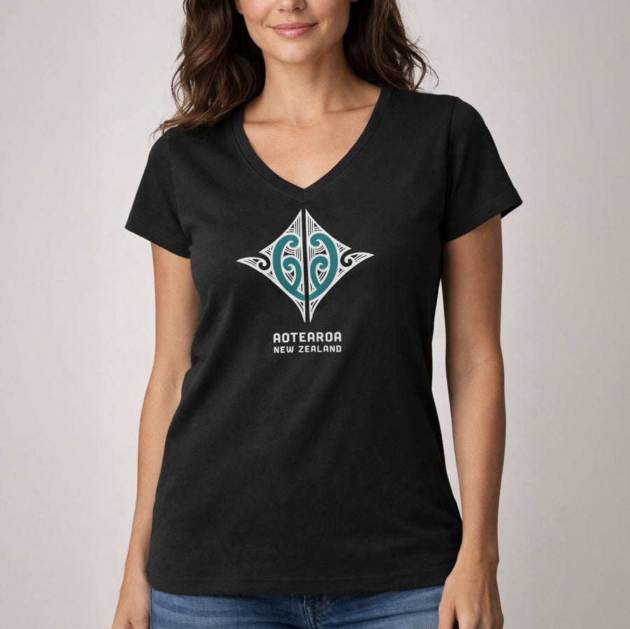 Women wearing a black V-neck t-shirt with a Maori design and New Zealand and Aotearoa text a plain background