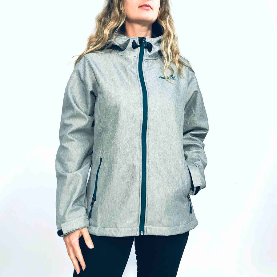 Women's grey hooded soft shell jacket with blue lining and zips. Water resistant tech shell. www.wild-kiwi.co.nz